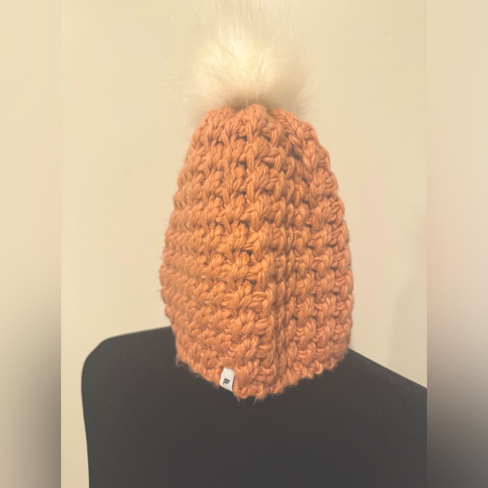 Brand new Fabletics pink woven winter beanie with white poof accent
